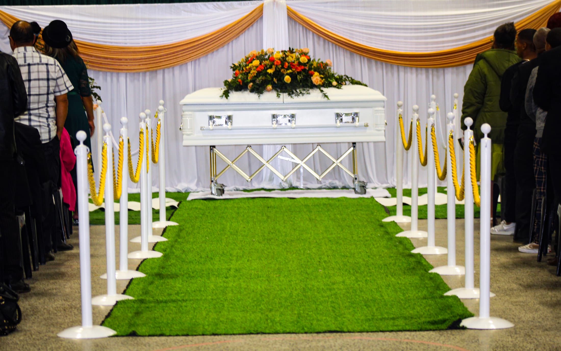A chapel prepared with flowers for a service